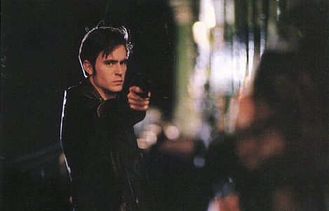 Michael Coleman holding a gun