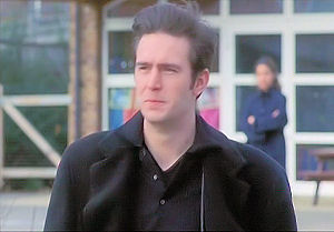 Mike walks away, clearly upset