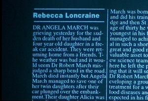 A newspaper article on microfilm about the death of Angie's husband