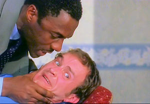 Vaughn questions Colin in a tough manner