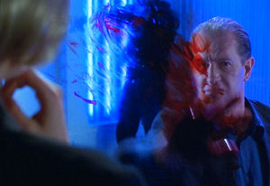 Dr Hoyle protests by smearing the blood Vaughn offered on the two way mirror