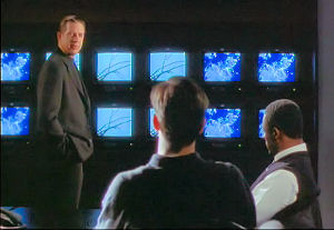 Mike and Vaughn bring Pearce up to speed re the videos they find in Jacob's old flat.